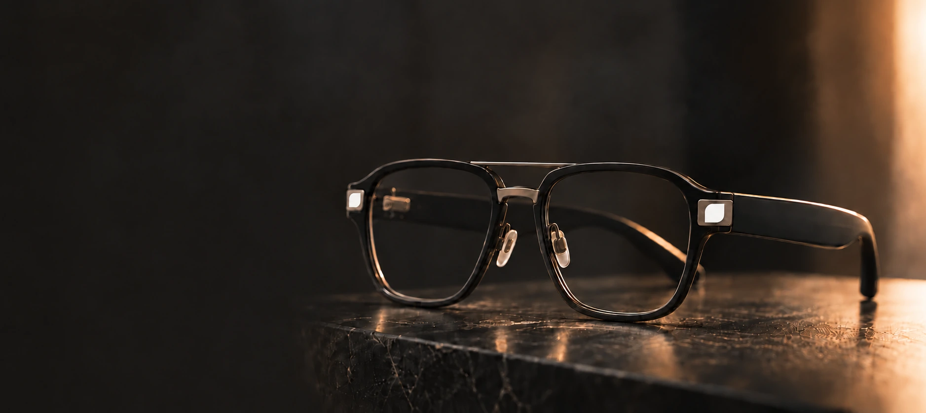 Executive Navigator frames on dark stone, with white See-Hear emblems centered on the front hinge plates.